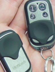 Microlatch 4 button RF remote control with slide cover.